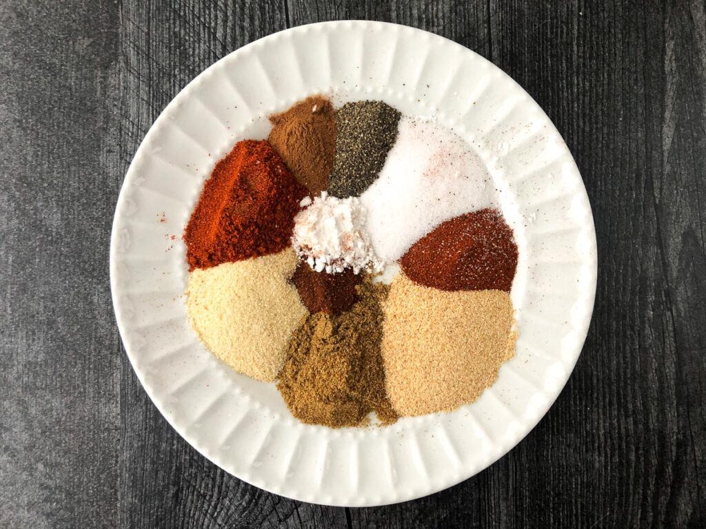 white plate with a variety of spices