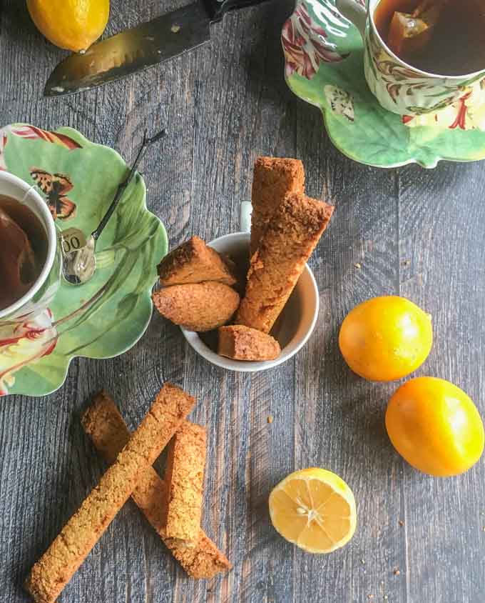 These Paleo Meyer lemon ginger biscotti are so easy to make and are gluten free. Fresh, Meyer lemon and spicy ginger are perfectly balanced with a hint of honey sweetness. 