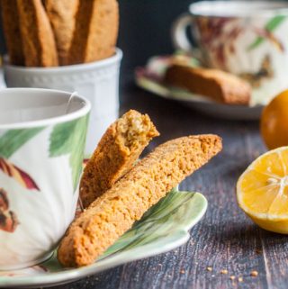 These Paleo Meyer lemon ginger biscotti are so easy to make and are gluten free. Fresh, Meyer lemon and spicy ginger are perfectly balanced with a hint of honey sweetness.