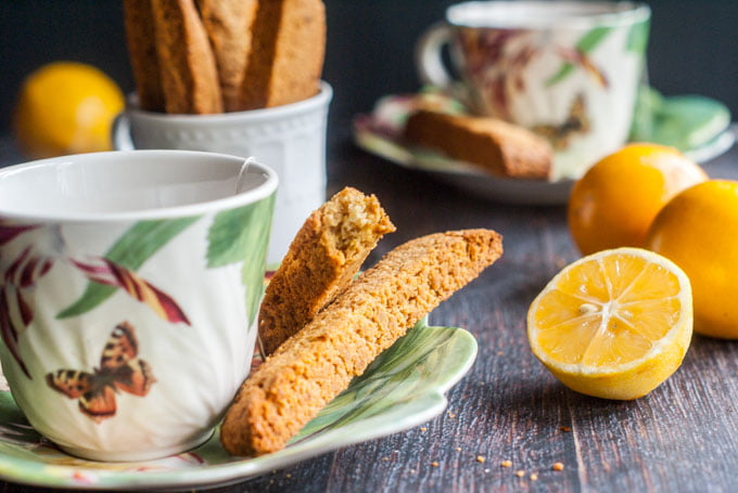 These Paleo Meyer lemon ginger biscotti are so easy to make and are gluten free. Fresh, Meyer lemon and spicy ginger are perfectly balanced with a hint of honey sweetness. 