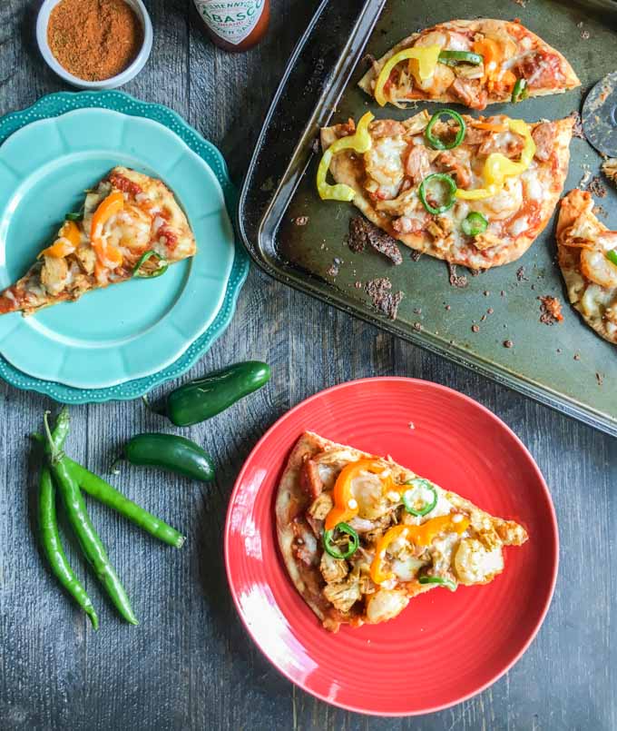 This spicy jambalaya flatbread is an easy and tasty dish. Spicy cajun flavors with succulent shrimp and andouille sausage make the perfect flatbread toppings.
