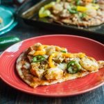 This spicy jambalaya flatbread is an easy and tasty dish. Spicy cajun flavors with succulent shrimp and andouille sausage make the perfect flatbread toppings.