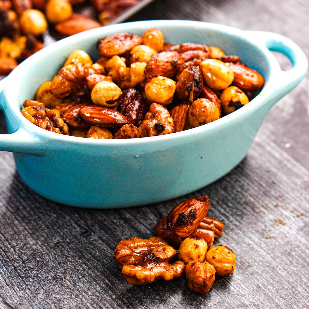 Blue bowl with Thai spicy mixed nuts.