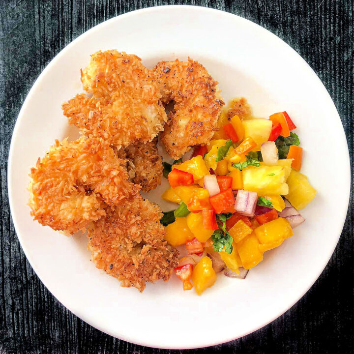 white plate with coconut shrimp