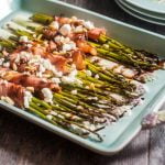 This wrapped asparagus with goat cheese & balsamic glaze is an easy and elegant side dish with only 6 ingredients. Salty ham, creamy cheese, fresh asparagus topped with sweet glaze and crunchy pine nuts. Perfection!