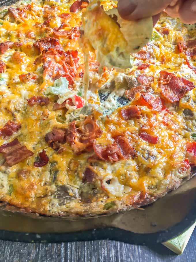 This alambre skillet cheese dip is has got it all: steak, peppers, onions, cheese and yes even bacon! A fun appetizer to celebrate Cinco de Mayo.