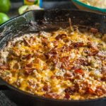 This alambre skillet cheese dip is has got it all: steak, peppers, onions, cheese and yes even bacon! A fun appetizer to celebrate Cinco de Mayo.