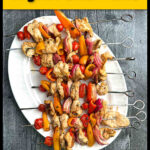 White plate with low carb grilled chicken fajitas skewers and text overlay.