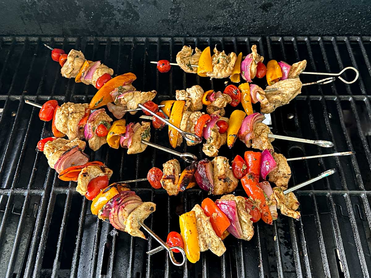 Grill with the chicken fajita skewers cooking.