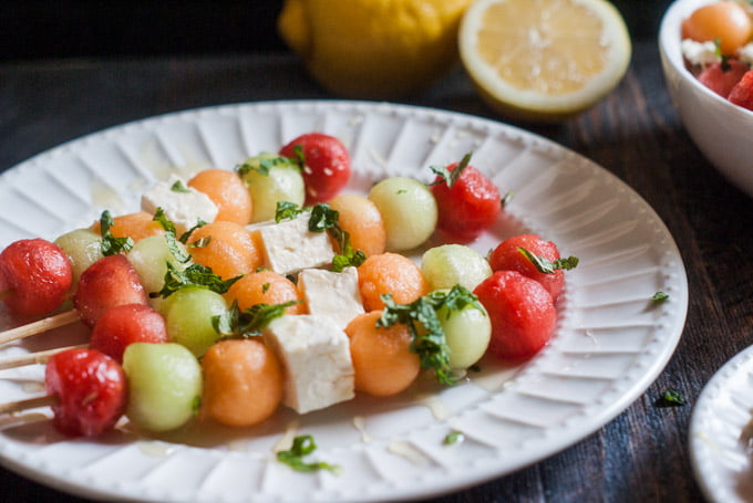 This feta melon salad with lemon & mint is perfect for spring and summer. It's sweet and savory and a delicious salad or side dish for your next party. 
