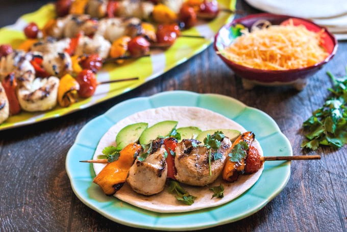 These grilled chicken fajita kebabs are a quick and easy dinner. Marinate the night before and eat as a taco or a salad. A delicious dinner on the grill!