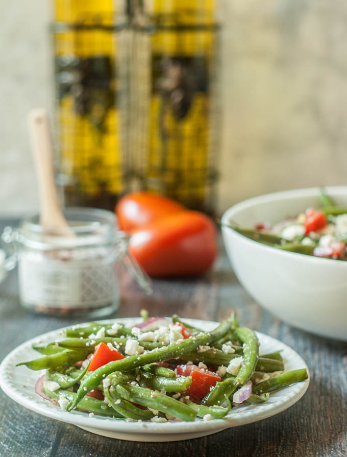 This Greek green bean salad is the perfect summer salad. Using vegetables from your garden or farmer's market, you can make this delicious vegetarian salad in 15 minutes. 