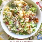 white bowls of keto broccoli cauliflower salad with bacon and text