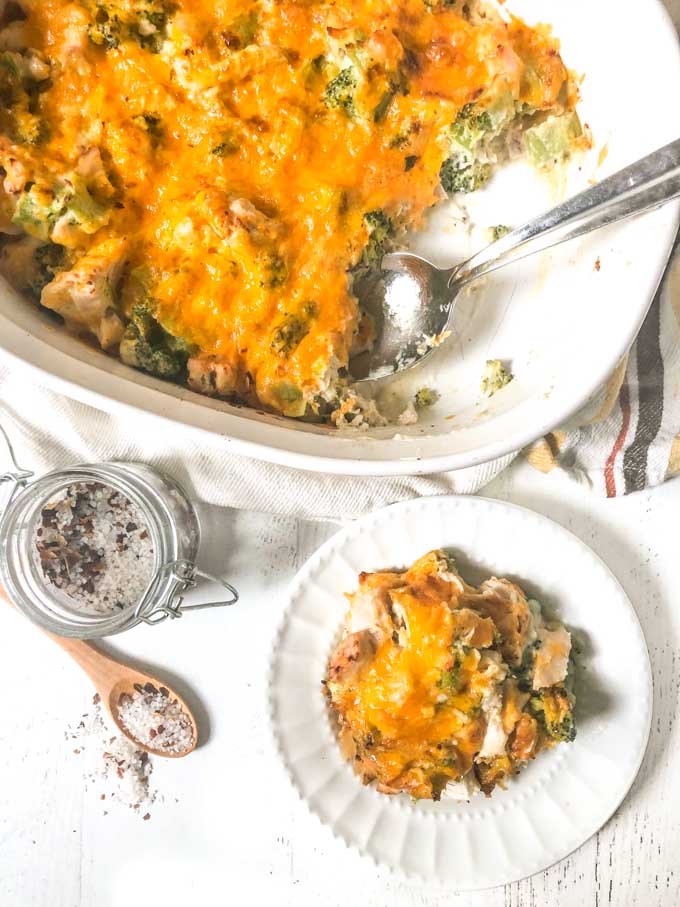 baking dish and white plate with low carb chicken and broccoli casserole