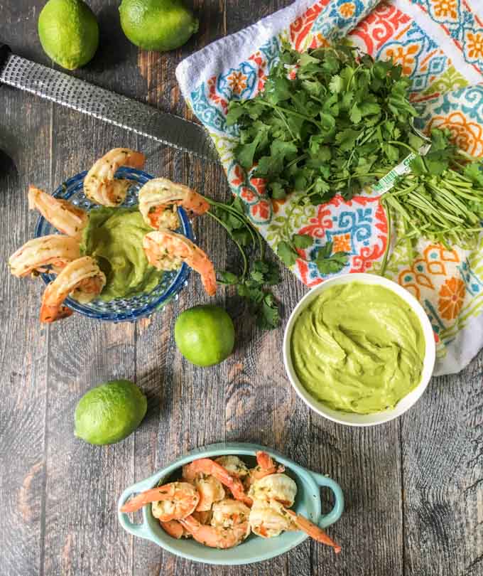This cilantro lime shrimp cocktail is a delicious low carb snack or lunch. The creamy avocado dipping sauce goes perfectly with the garlicky, herbal marinated shrimp. Can eat hot or cold.