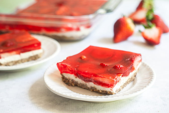 white plate with strawberry pretzel salad low carb version