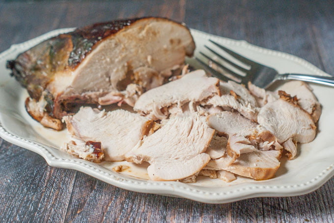 brined smoked turkey breast on a platter