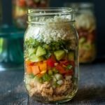 Here are 5 low carb cauliflower salad jars you can take or eat for lunch this week. All full of healthy, satisfying ingredients and come in the following flavors: Mexican, Cobb, Asian, Nicoise and Greek.