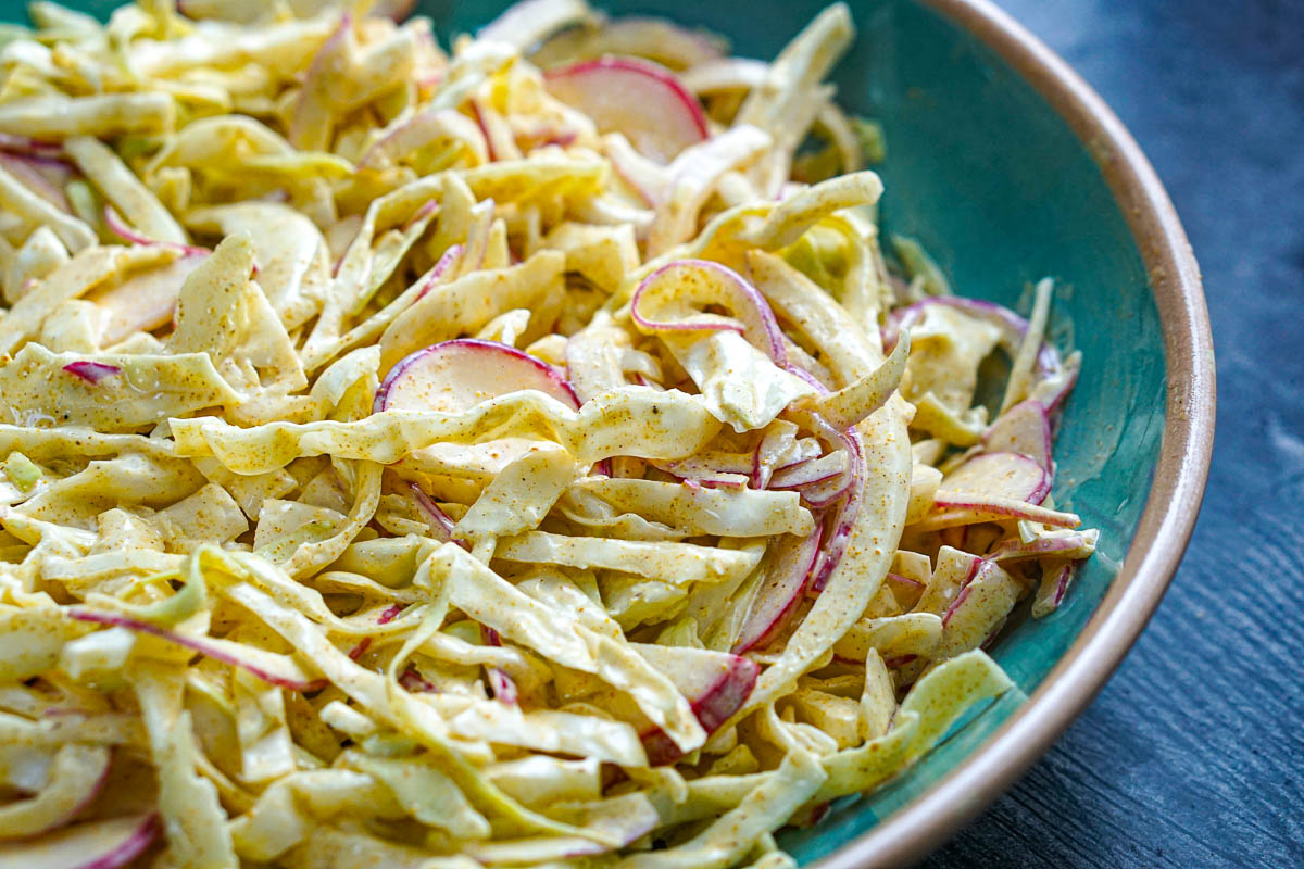 Radish & Cabbage Curried Coleslaw - a tasty low carb summer side dish - only 3.2g net carbs! Closeup of the spicy slaw.