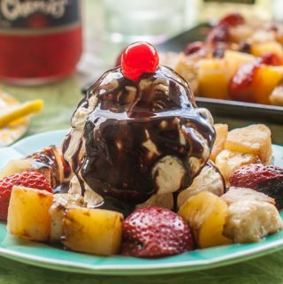 These grilled banana split kebabs are a fun dessert and perfect for a summer impromptu dinner with family and friends. Just add a scoop of ice cream and a bit of chocolate sauce and you are good to go!