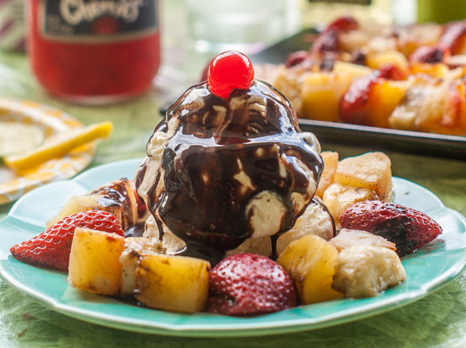 These grilled banana split kebabs are a fun dessert and perfect for a summer impromptu dinner with family and friends. Just add a scoop of ice cream and a bit of chocolate sauce and you are good to go!