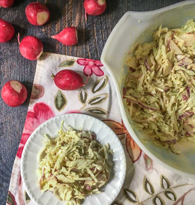 This radish & cabbage curried coleslaw is a tasty change of pace from your usual coleslaw. It's also low carb at only 3.2g net carbs per serving.