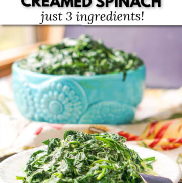 white plate with cheesy spinach and blue bowl in the background and text