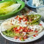 This grilled Romaine wedge salad is a fun light summer dinner and tastes great with a the low carb blue cheese dressing! Only 1.2g net carbs for 2 tablespoons of this yummy blue cheese dressing.