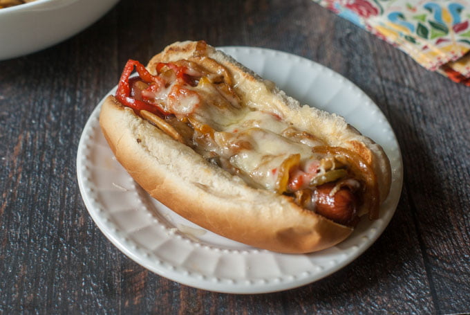 This Philly Mushroom Swiss Hot Dog is an easy and tasty way to dress up your dog. Onions, peppers, mushrooms and Swiss cheese make the perfect complement to a salty hot dog. And of course we have 2 low carb versions for you to try as well!