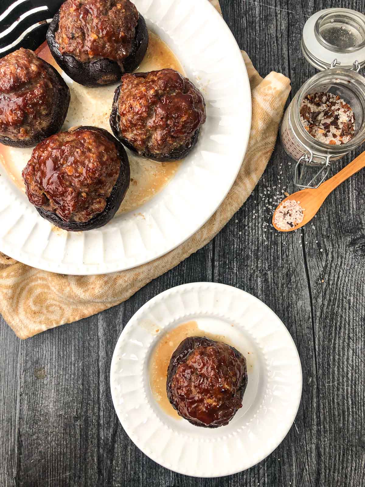 aerial view of keto stuffed mushrooms on white plates