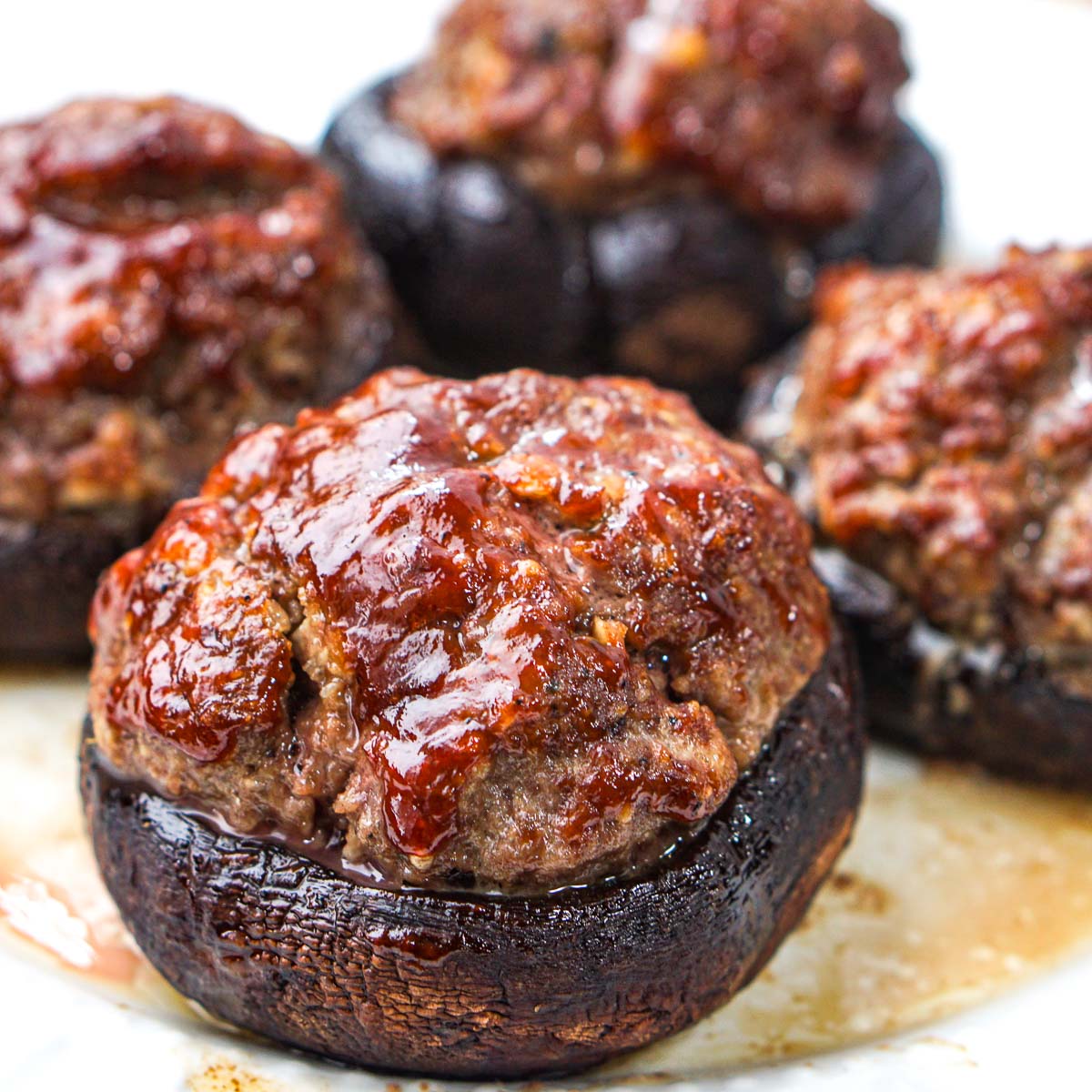 closeup of a keto meatloaf stuffed portobello mushroom