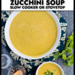 Aerial view of two white bowls with Thai curry creamy zucchini soup and text overlay.