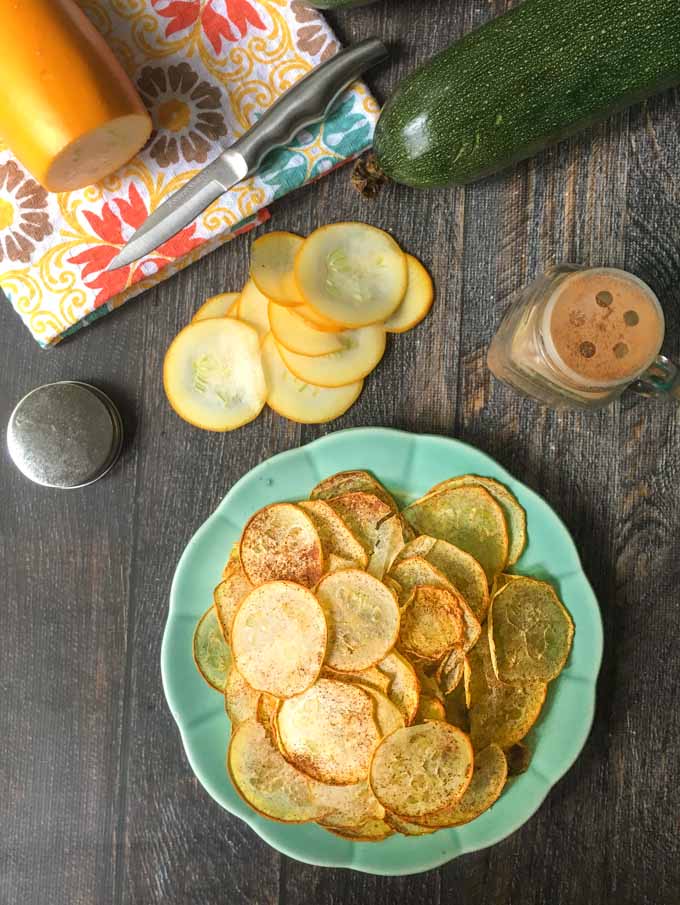 These low carb cinnamon zucchini chips are easy to make and a great way to use zucchini from the garden. Plus 25 of these chips have only 15 calories and 1.8g net carbs!