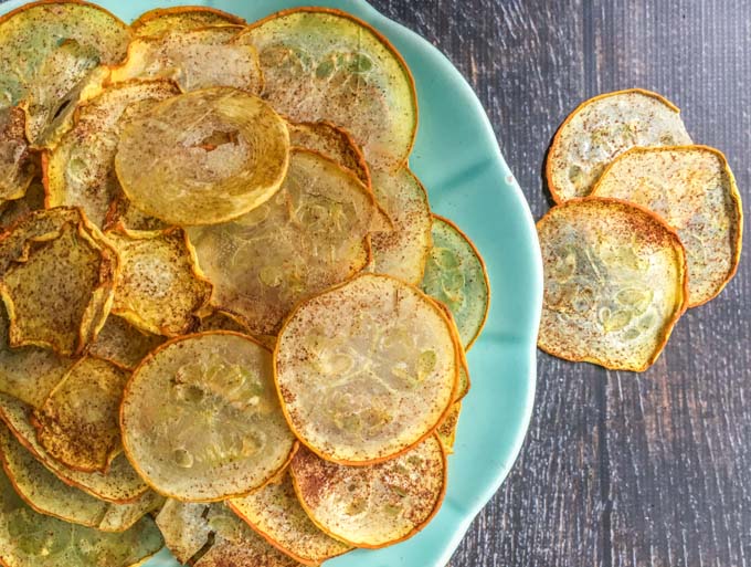 These low carb cinnamon zucchini chips are easy to make and a great way to use zucchini from the garden. Plus 25 of these chips have only 15 calories and 1.8g net carbs!