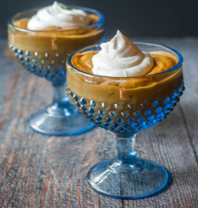 blue serving dishes for healthy pumpkin pie pudding with coconut whipped cream