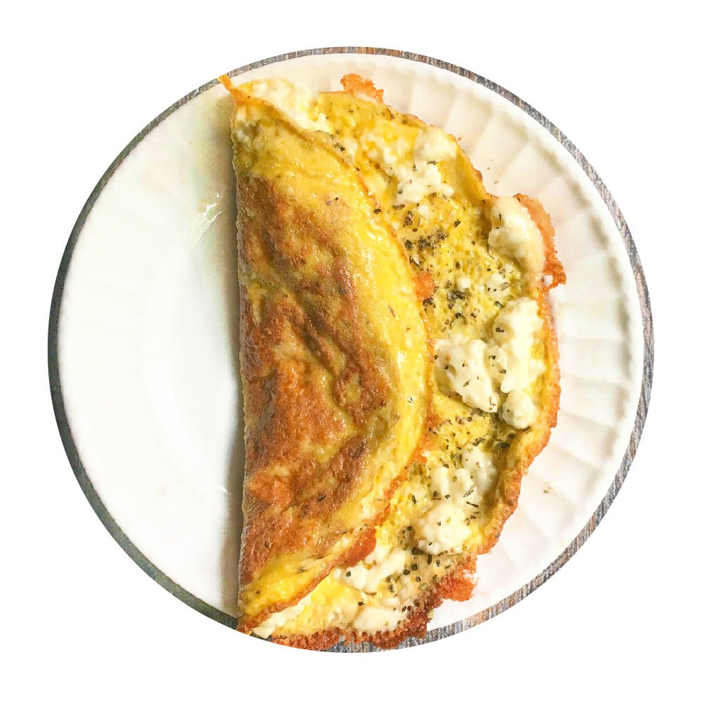 Greek feta cheese omelet on white plate