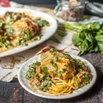 This slow cooker creamy tomato chicken & spinach dish is full of flavor and easy for a weeknight dinner. The rich and creamy sauce is perfect with the fresh spinach and chicken and only 3.3g net carbs!