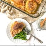 baking dish and white plate with stuffed chicken thighs and text overlay