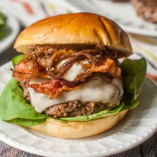 This decadent bacon cheeseburger with balsamic onions & garlic aioli is the perfect combination. Sweet onions, salty bacon, creamy Swiss and garlicky aioli make the perfect combination. Skip the bun to make it low carb! 