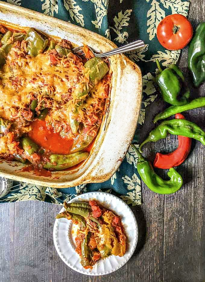 These cheesy chorizo stuffed chiles are an easy and tasty appetizer that's low carb too. The spicy chorizo and the melty cheese make these peppers a winner!