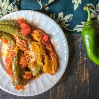These cheesy chorizo stuffed chiles are an easy and tasty appetizer that's low carb too. The spicy chorizo and the melty cheese make these peppers a winner!