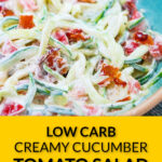 Closeup of an aqua plate with a serving of creamy cucumber salad with tomatoes, ranch and bacon and text.