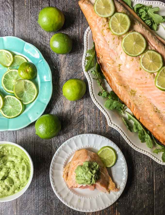 This lime margarita grilled salmon is a delicious and simple low carb dinner. The garlicky avocado mayo goes perfectly with the tangy lime infused salmon and has only 1.5g net carbs per serving.