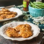 These low carb breaded pork cutlets are an easy and delicious dinner that only uses 4 ingredients.  Only 0.2g net carbs per piece of breaded pork.