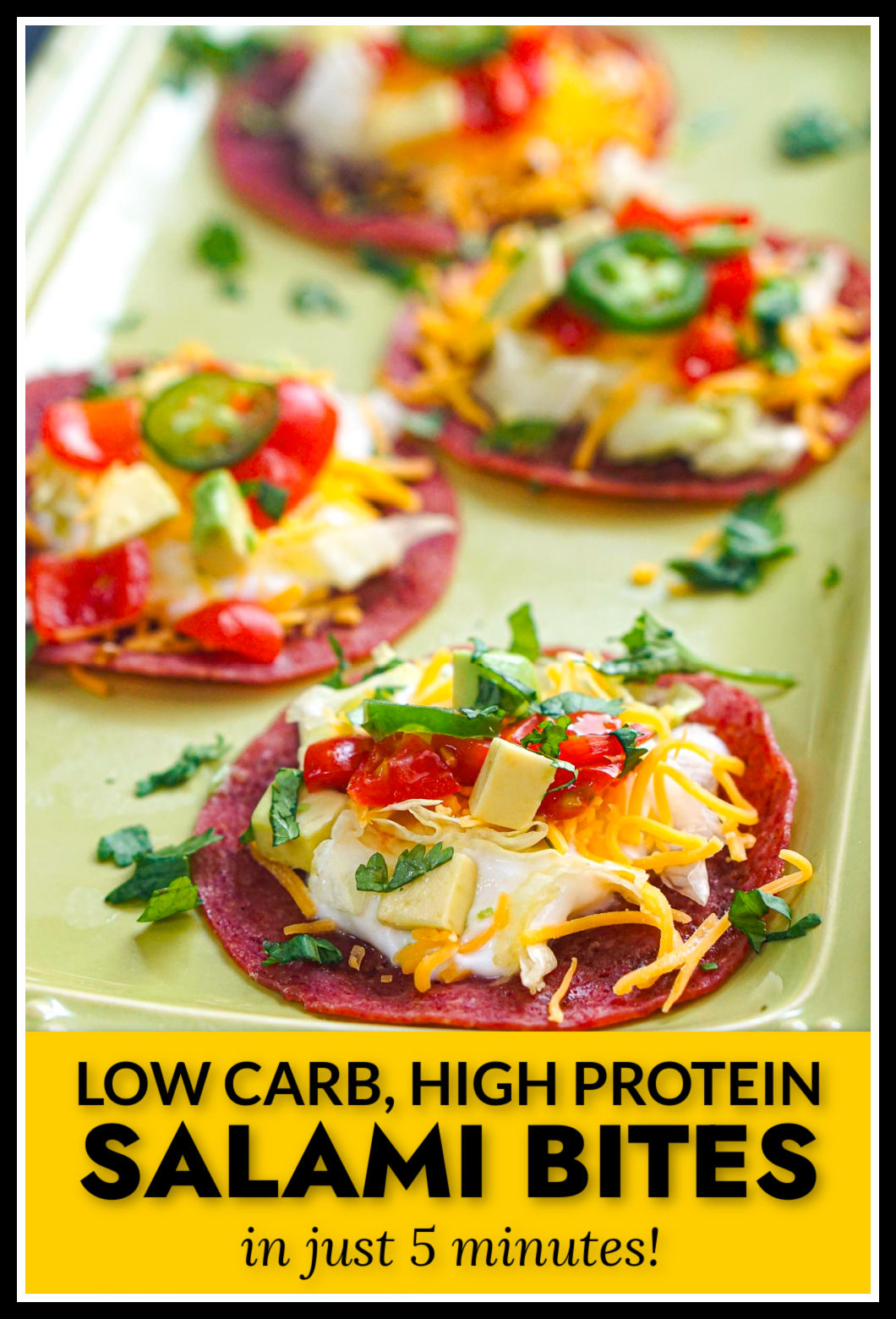 Closeup of a green platter with keto salami tostada bites and text.