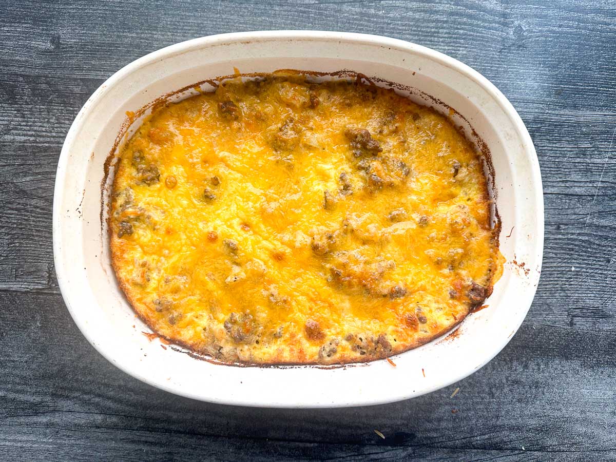 white baking dish with cheesy ground beef dish fresh from the oven