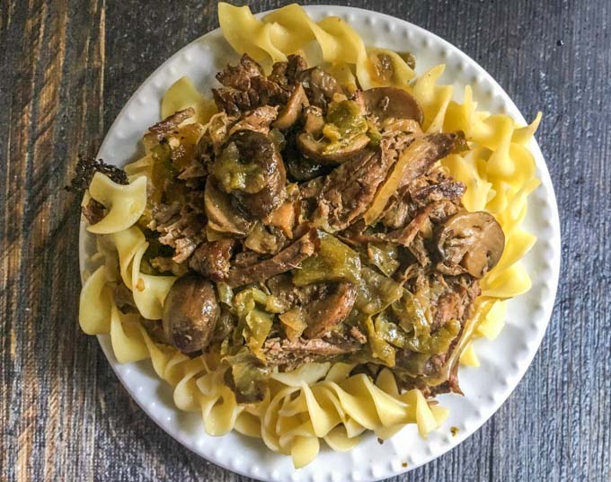 This versatile dinner of Low Carb Cheese Steak Pot Roast is an easy dinner you can make in the Instant Pot or slow cooker. For a low carb dinner, eat as is with melted cheese. However you can also eat it over noodles or rice and then make soup or sandwiches from the leftovers! 