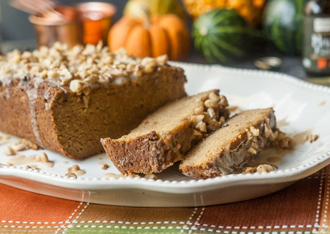 This pumpkin bread with maple walnut glaze is so good you won't believe it's gluten free and sugar free! Perfect with a good cup of tea or coffee over the holiday season.