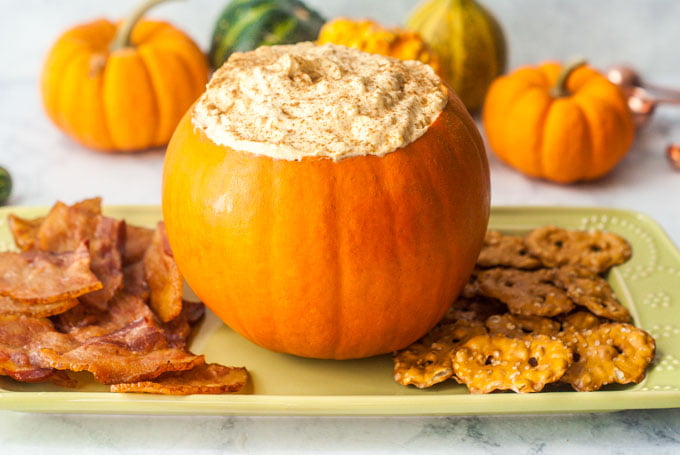 This pumpkin cheesecake dip with bacon chips is the perfect combination of salty and sweet and just happens to be low carb too! This is an appetizer everyone will love because, hey... it's bacon and cheesecake!