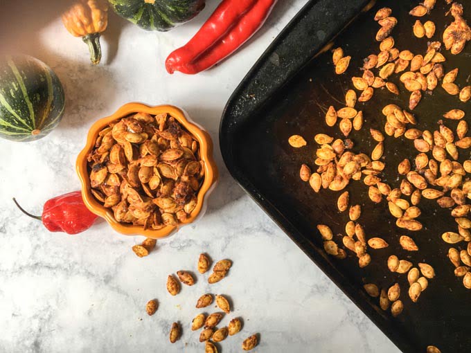 These roasted Thai curry pumpkin seeds are addicting! You've got to try this nice little twist when you make your roasted pumpkin seeds this fall. Only 2.1g net carbs per serving.